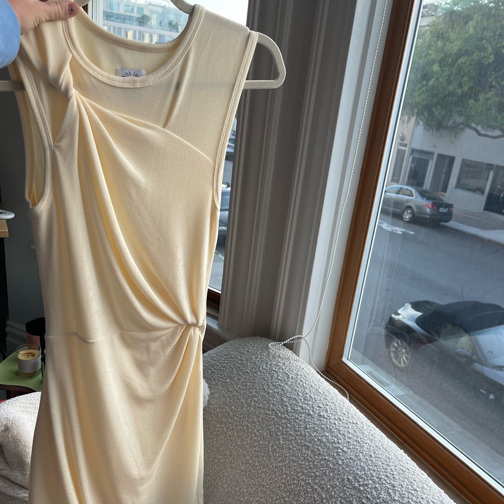 With Jean Dani dress in pearly yellow